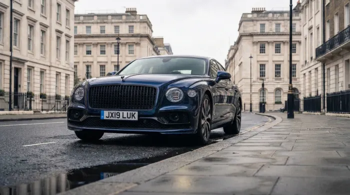 Dark blue Bentley Flying Spur for chauffeur car hire in Reading